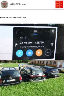 Fotodokumentace vozidla 18. 09. 2026. Horní část obsahuje navigační obrazovku s detailem cíle: Za Valem 1428/19, Praha-Kunratice, Praha. Dolní část zobrazuje f…