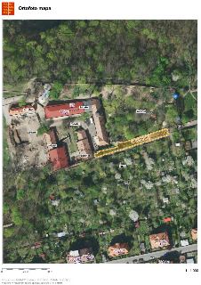 Ortofoto mapa zobrazující katastrální území s vyznačenými parcelami a budovami. Vyznačená čísla parcel: 1877/5, 1877/2, 118/1, 1877/1, 1879, 1877/4, 1877/3, 21…