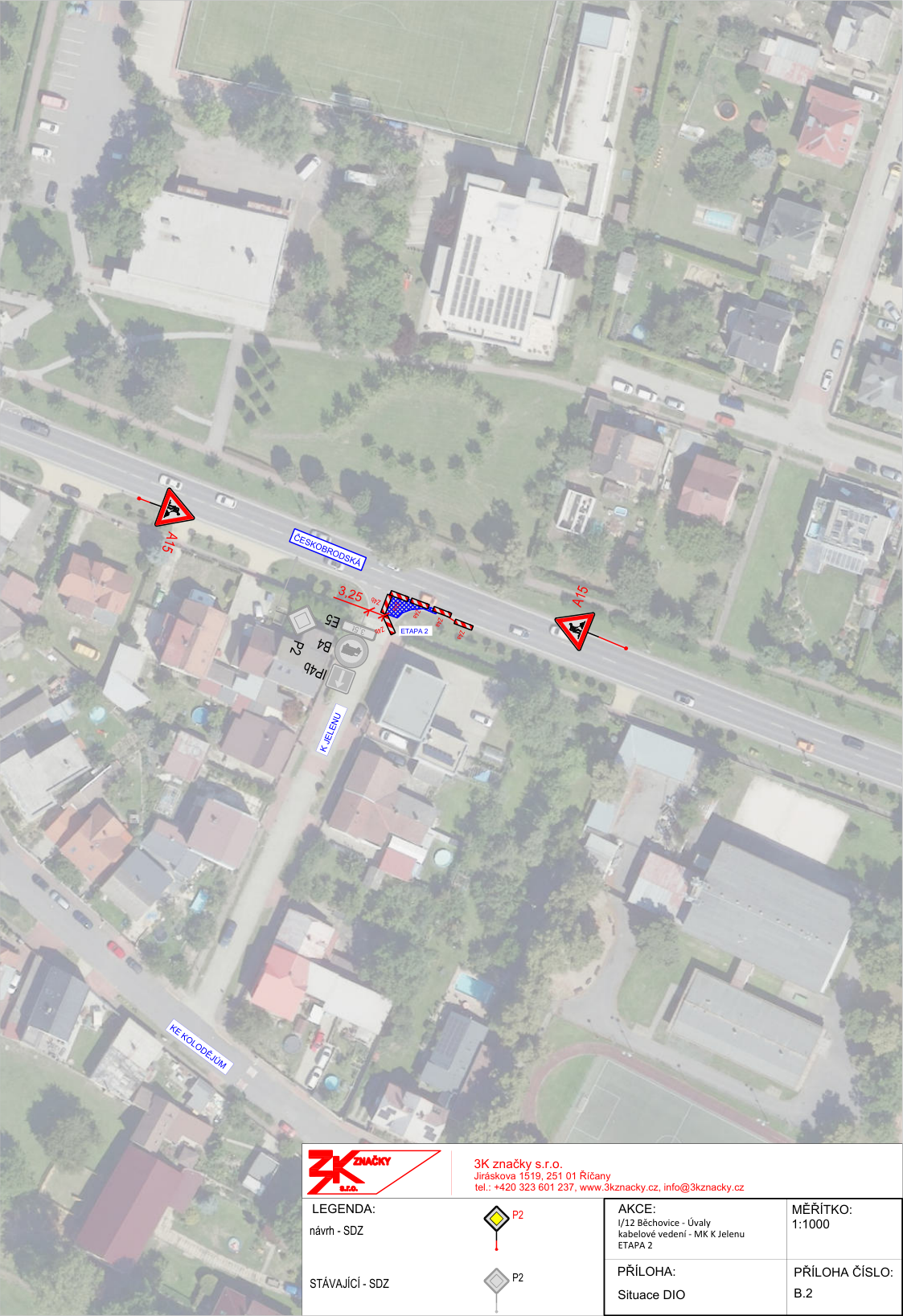 Situační nákres dopravního značení (DIO) pro akci 'I/12 Běchovice - Úvaly, kabelové vedení - MK K Jelenu, ETAPA 2'. Mapa zobrazuje umístění dopravních značek (A15, P2, B4, E5, IP4b) v oblasti ulic Českobrodská a Ke Jelenu. Zhotovitel: 3K značky s.r.o., Jiráskova 1519, 251 01 Říčany, tel.: +420 323 601 237, www.3kznacky.cz, info@3kznacky.cz. Měřítko: 1:1000. Příloha č.: B.2.