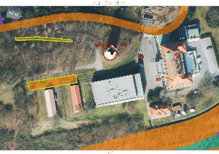 Ortofotomapa území v k.ú. Smíchov s vyznačenými pozemky. V mapě je text 'k.ú. Smíchov', 'Ministerstvo vnitra' u vyznačeného objektu a dva obdélníky s popiskem…