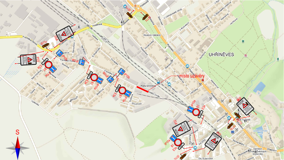Situační nákres dopravního značení v Uhříněvsi v souvislosti s uzavírkou ulice Františka Diviše. Mapa zobrazuje trasu ulice Františka Diviše s vyznačeným místem uzavírky (červená čára) a rozmístěním dopravních značek (IP22, IS11c, B1, E3a, IP10a, IP10b). Značky IP22 obsahují text: 'POZOR Františka Diviše PO 400 m NEPRŮJEZDNÁ'. V mapě jsou uvedeny názvy ulic: Podleská, U Uhříněveské obory, Přátelství, Františka Diviše, Nad Volyňkou, Jezerská, Vlárská, Bystřičná, Sulická, Dopravní, Kozákovská, Na Blanici, K Podchodu, Dunajská, Lidického, Morávkova, Křesínská, Ke Kříži, Oty Bubeníčka, Semanská, náměstí Protifašistických bojovníků.