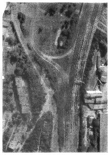Situační nákres (ortofotomapa) dopravního uzlu s vyznačenými informacemi: 'NAJEZD NA UL. MICHELSKA', 'SMĚR JIŽNÍ MOST', 'SMĚR CENTRUM', 'SJEZD NA ULICI V PODZÁ…