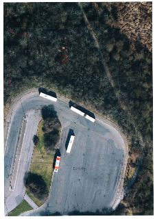 Ortofotomapa s vyznačenými katastrálními hranicemi a parcelními čísly. Na obrázku jsou patrná čísla parcel: 537/6 (parkoviště s autobusy), 536/195, 537/45, 537…