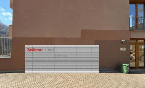 Vizualizace umístění samoobslužného výdejního boxu Z-BOX u budovy.