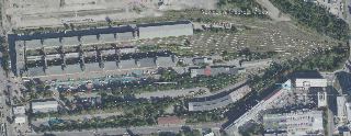 Ortofotomapa území Nákladové nádraží Žižkov, p.č. 4450/1. V mapě jsou zakresleny linie kolejí, hranice pozemků a technické prvky areálu. V pravé dolní části je…