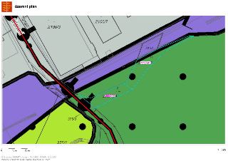 Výřez z územního plánu Prahy s vyznačenými parcelami. Čitelné údaje: 'územní plán', 'PRAHA PRAGUE PRAGA PRAG', měřítko 1:595, čísla parcel: 2100/3, 2100/7, 310…