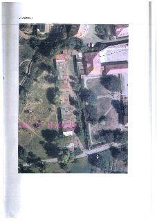 Ortofotomapa s vyznačenou řadou garáží a přístupovou cestou. V mapě jsou patrná čísla parcel (např. 15/1, 15/12, 4/1) a text 'ad U Hvězdy'. Modré šipky s čísly…