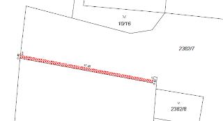 Katastrální mapa zobrazující parcelní čísla 10/16, 2382/7 a 2382/8, s vyznačeným červeně šrafovaným obdélníkovým prvkem o délce 17.40 a šířce 0.40 označeným bo…